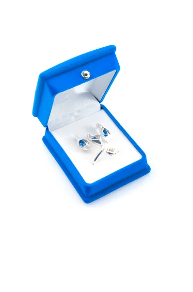 Luxury earrings in blue velvet jewelry box — Stock Photo, Image