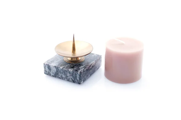 Candlestick made of stone and candle — Stock Photo, Image