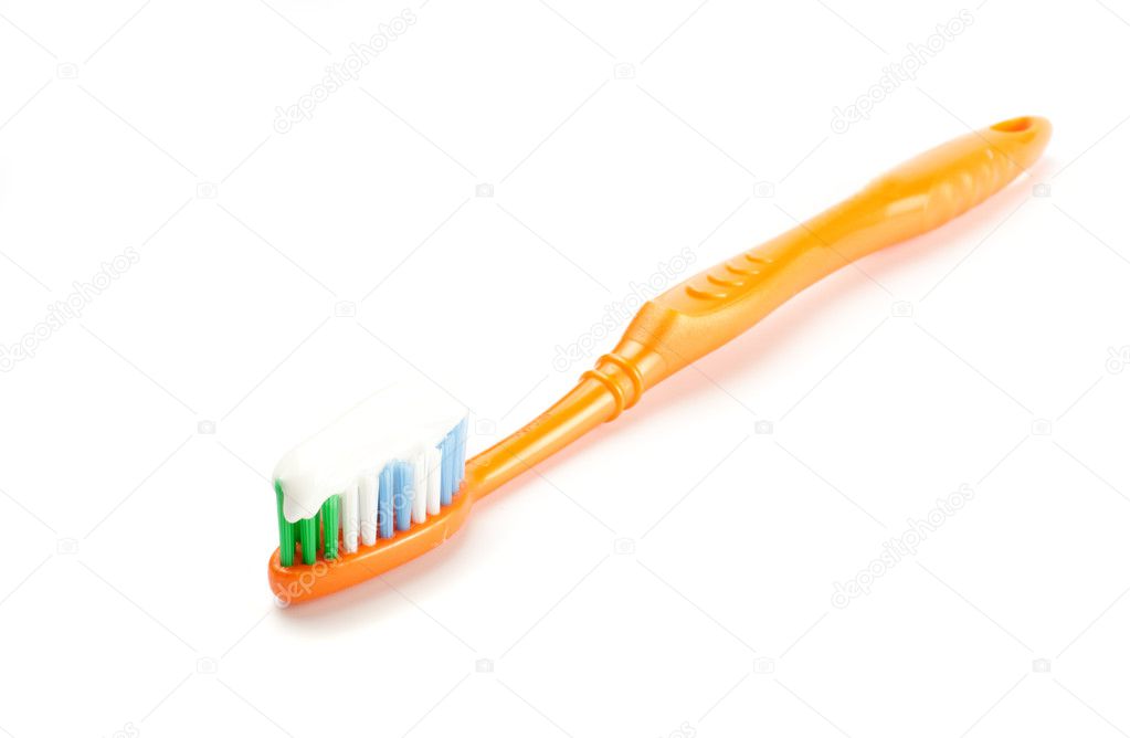 Toothbrush with toothpaste with white background