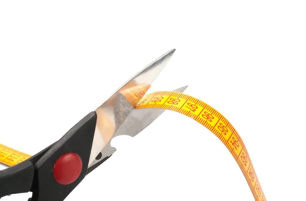 Forbici che tagliano una misurazione — Foto Stock