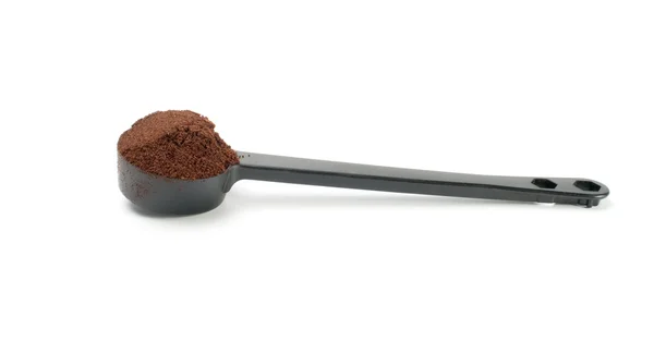 Coffee in plastic spoon — Stock Photo, Image