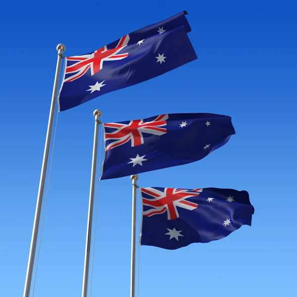Drei australische Flaggen vor blauem Himmel. 3D-Illustration. — Stockfoto