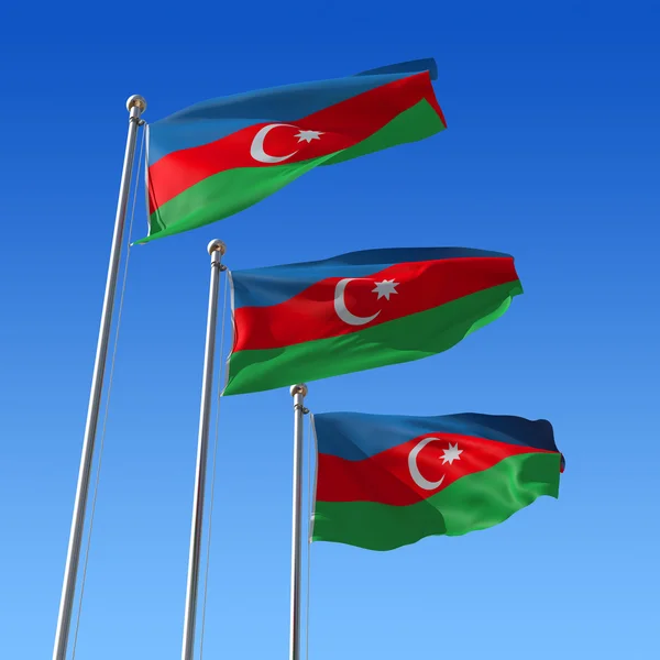 Tre flaggor Azerbajdzjans mot blå himmel. 3D illustration. — Stockfoto