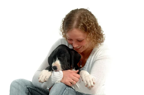 Young woman and sleeping puppy — Stock Photo, Image