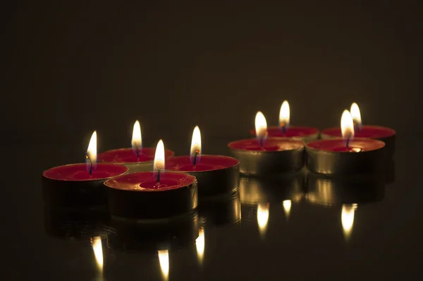 Восемь свечей отраженного чая Лицензионные Стоковые Фото