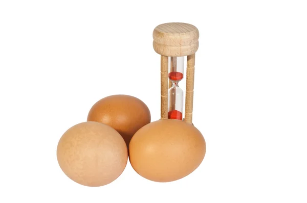 Temporizador de huevos y huevos Imagen de stock