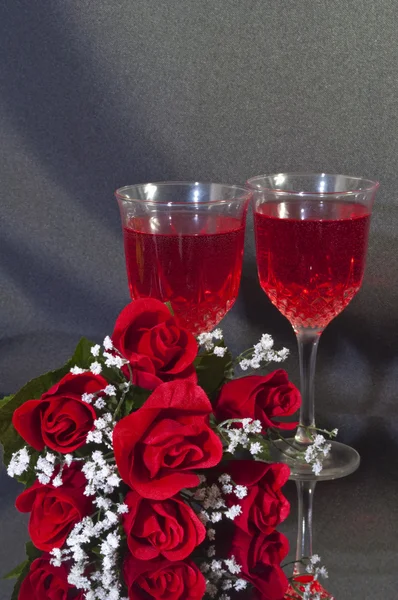 Vino y rosas Imagen de stock