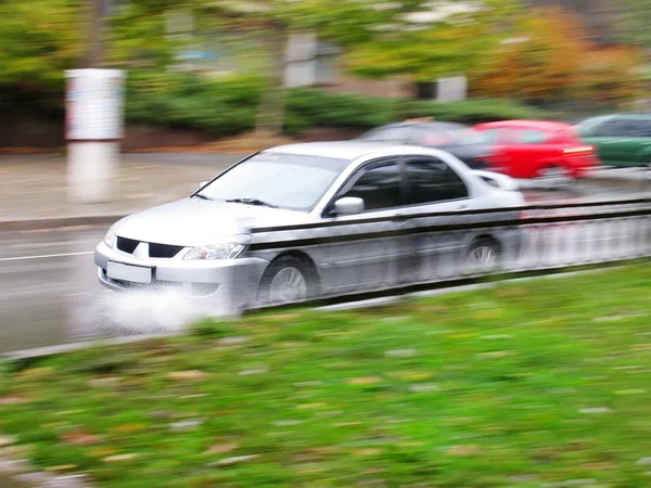 Coche en movimiento rápido —  Fotos de Stock