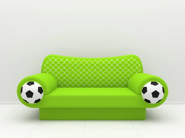โซฟาสีเขียวที่มีสัญลักษณ์ฟุตบอล — ภาพถ่ายสต็อก