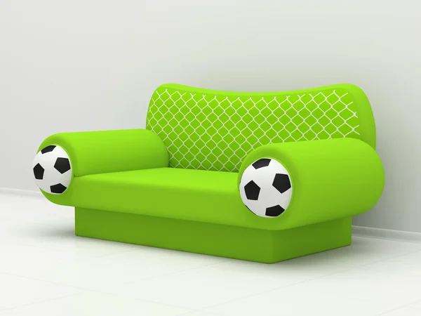 Green sofa with football symbolics — Stock Photo, Image