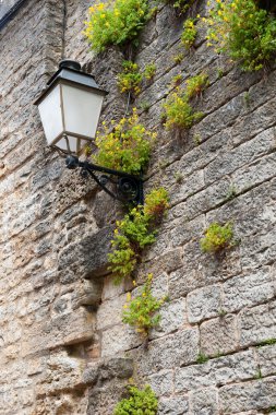 Old French village with lantern clipart