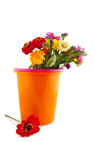 Colorful flower bouquet in bucket — Stock Photo, Image