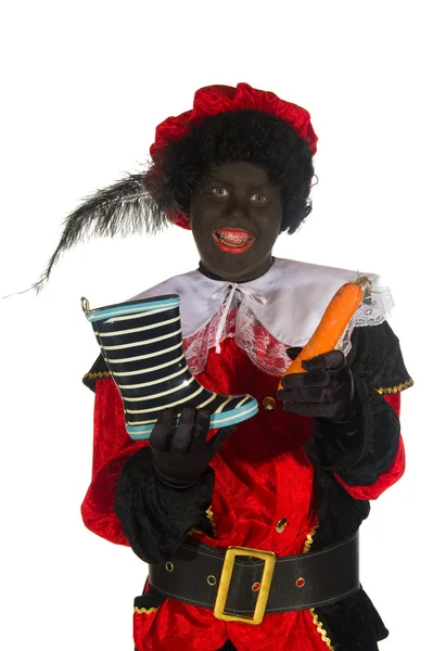 Black Piet with shoe and carrot — Stock Photo, Image
