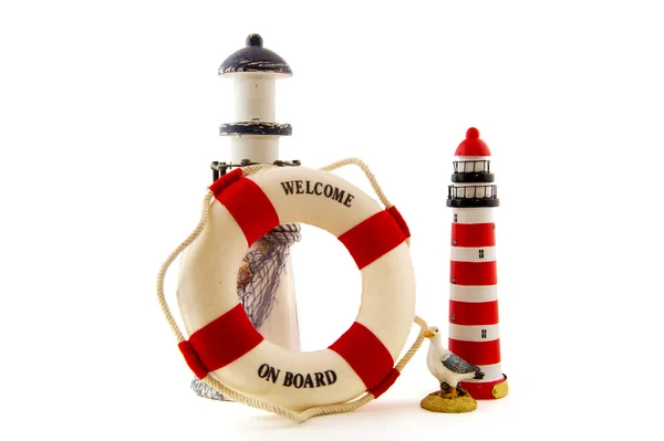 Lighthouse with life buoy — Stock Photo, Image
