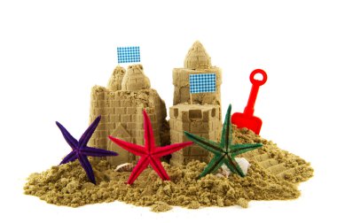 Sandcastle at the beachwith starfishes isolated over white clipart