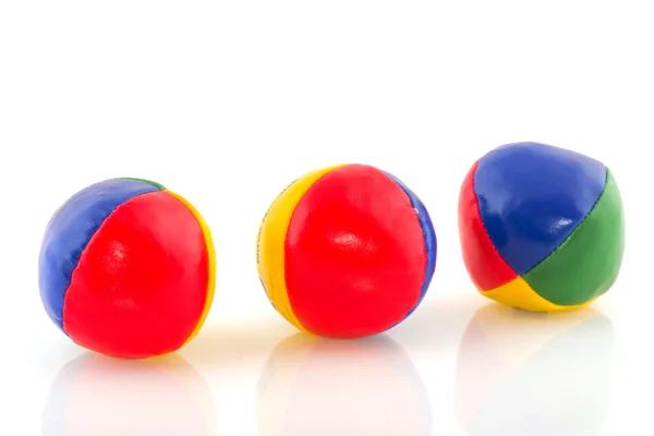 Три Барвисті Кульки Жонглювання Ізольовані Над Білим — стокове фото