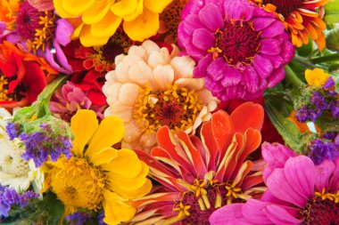 Colorful flower bouquet with many different mixed flowers clipart