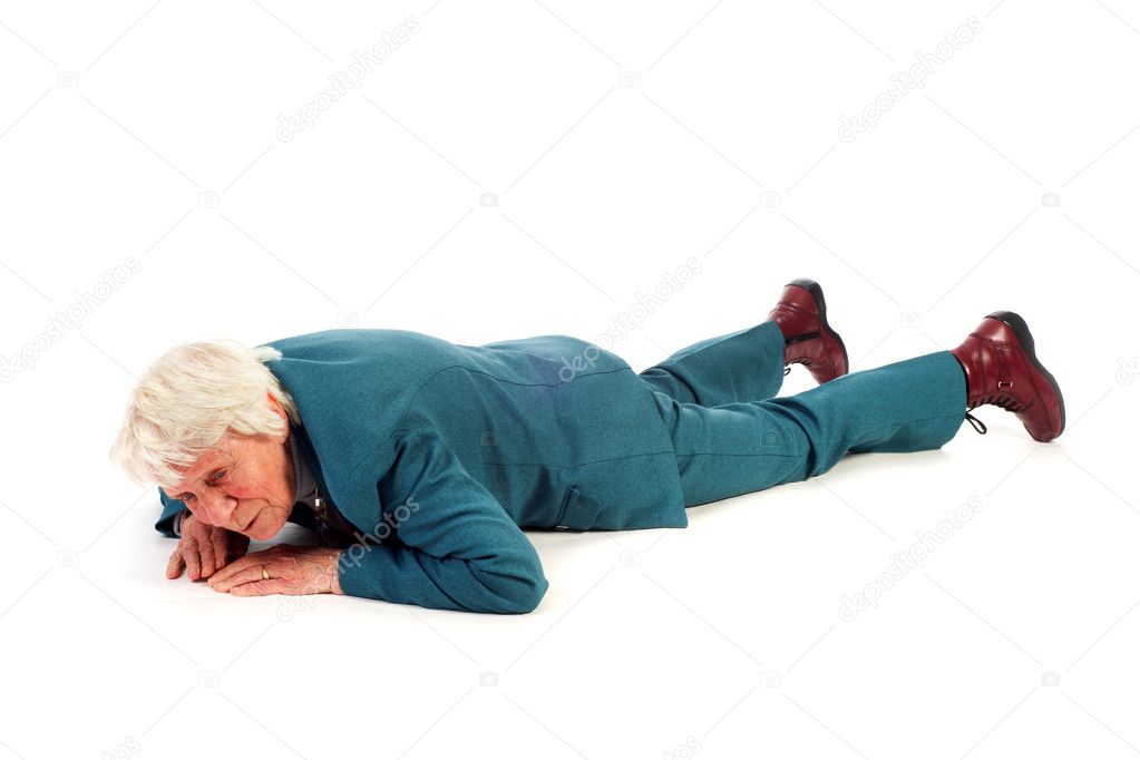 Old woman is fallen at the floor