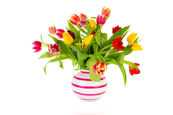 Kleurrijke tulpen in vaas — Stockfoto