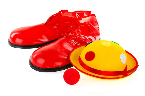 帽子靴と赤い鼻のピエロ機器 — ストック写真