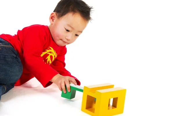 Portrait Chinese Boy Playing Wooden Puzzle Isolated White — Stock Photo, Image