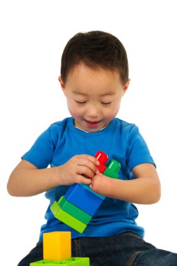 Chinese boy with light handicap playing clipart