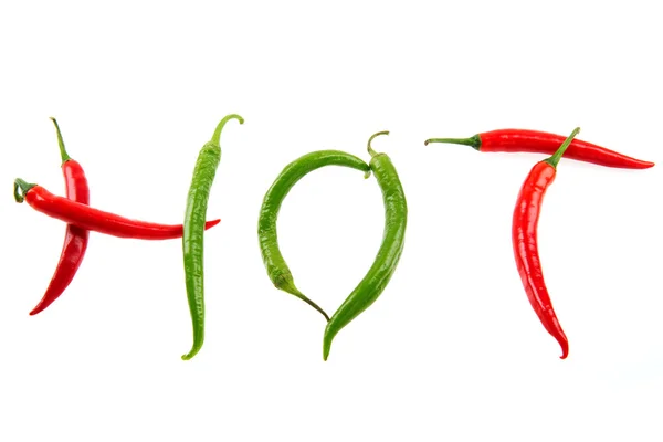 stock image Spicy hot peppers in green and red