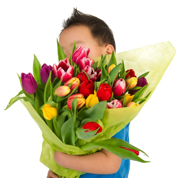 Niño con flores —  Fotos de Stock