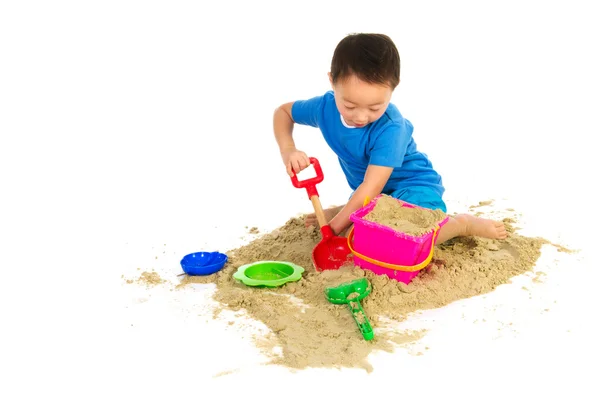 Chinese boy playing at the beach — Stock Photo, Image