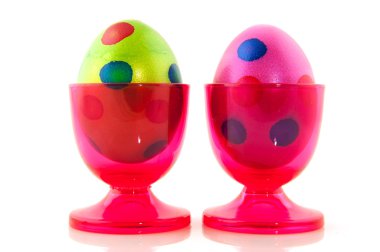 Colorful easter eggs in cups