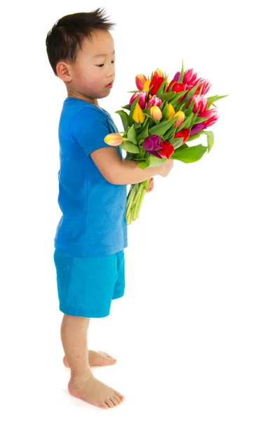 stock image Asian boy with flowers