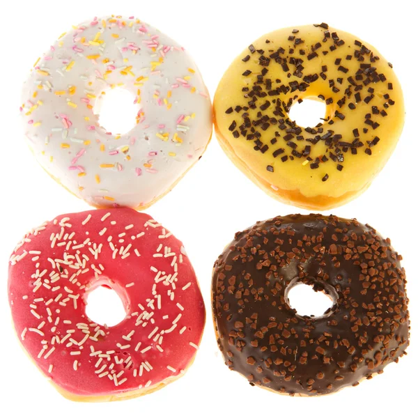 Fyra färska donuts — Stockfoto