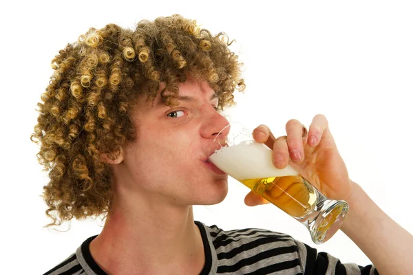 Young boy is drinking beer — Stock Photo, Image