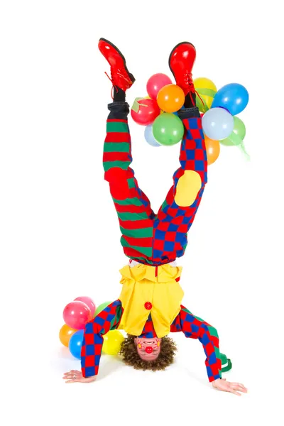 Zabawny clown w headstand — Zdjęcie stockowe