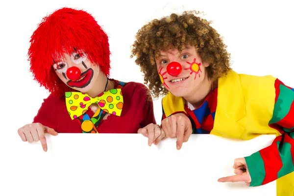 Funny clowns with white board — Stock Photo, Image