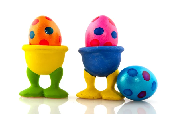 Colorful easter eggs in cups — Stock Photo, Image