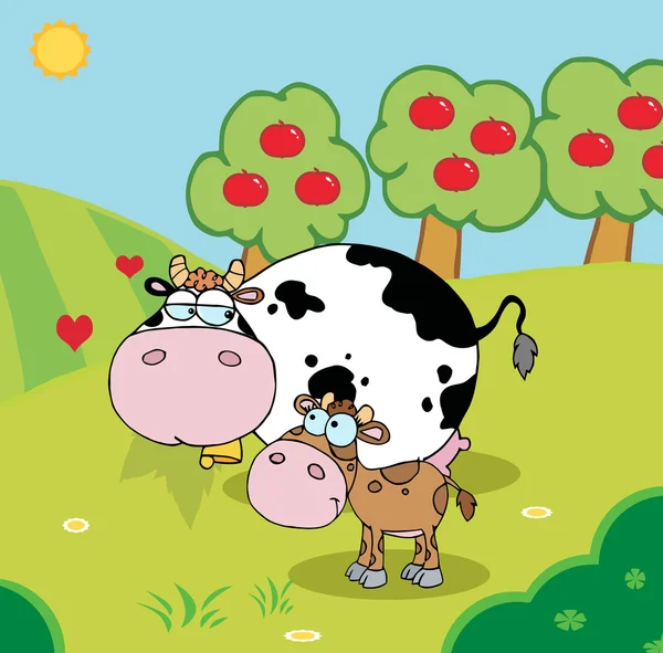 Dziecko i mama krowy w pastwiska w pobliżu orchard — Zdjęcie stockowe