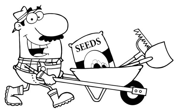 Paisajista masculino delineado empujando semillas, un rastrillo y una pala en una carretilla — Foto de Stock