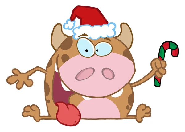 Vaca de Navidad sosteniendo una caña de azúcar —  Fotos de Stock