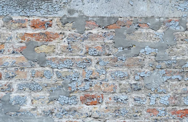 Scaled off brick wall — Stock Photo, Image