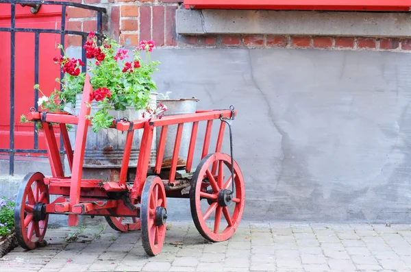 Old Red Cart Decorated Metal Bucket Geraniums — Stock Photo, Image
