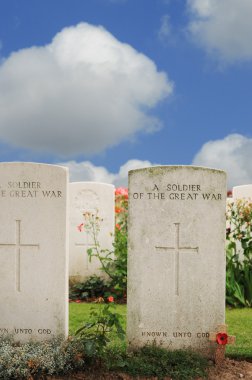 Graves of unknown fallen soldiers in World War I at Tyne Cot cemetery in Passchendaele, Ypres, Flanders clipart