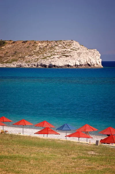Red Umbrellas Beach Rhodes Greece — Stock Photo, Image