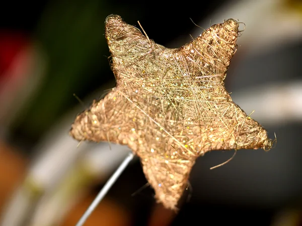 Die Weihnachtsdekoration Goldener Stern — Stockfoto