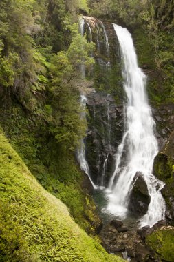 Waterfall in ravine clipart