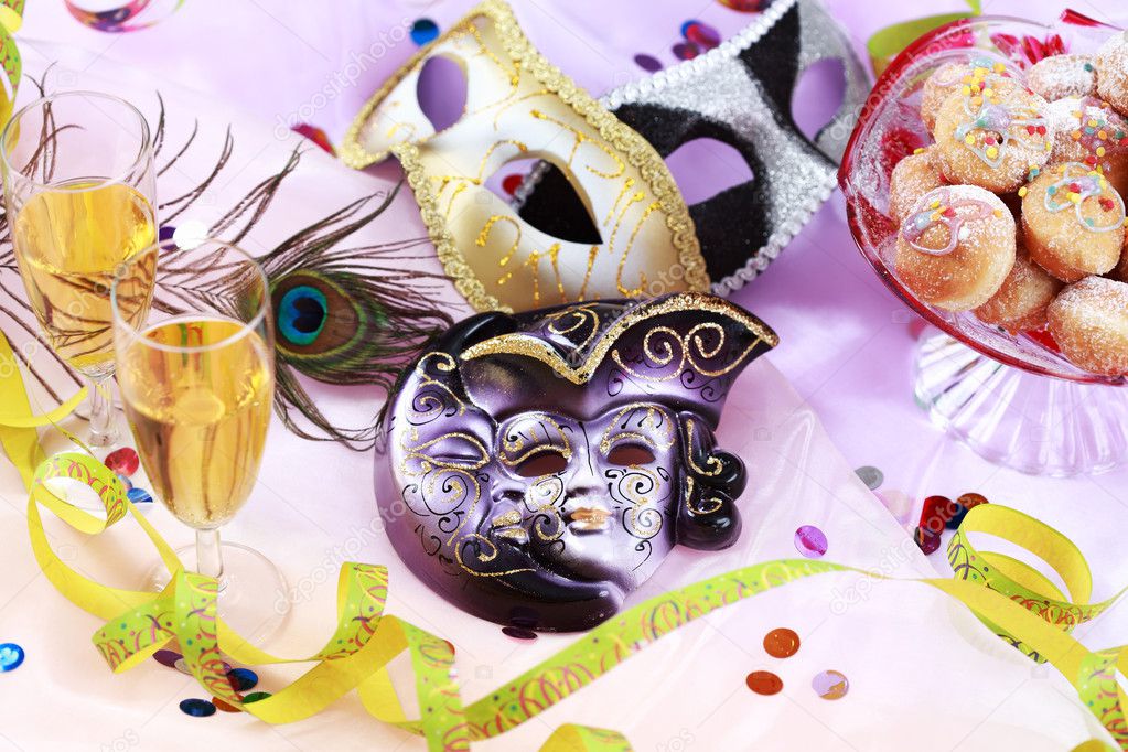 Carnival and party place setting with mask