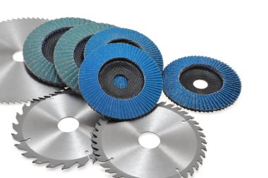 Circular saw blades and abrasive disks isolated on white clipart