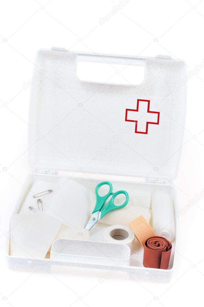 Open first aid kit isolated on white background
