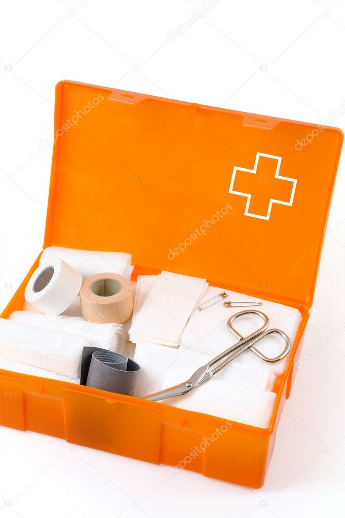 Open first aid kit isolated on white background