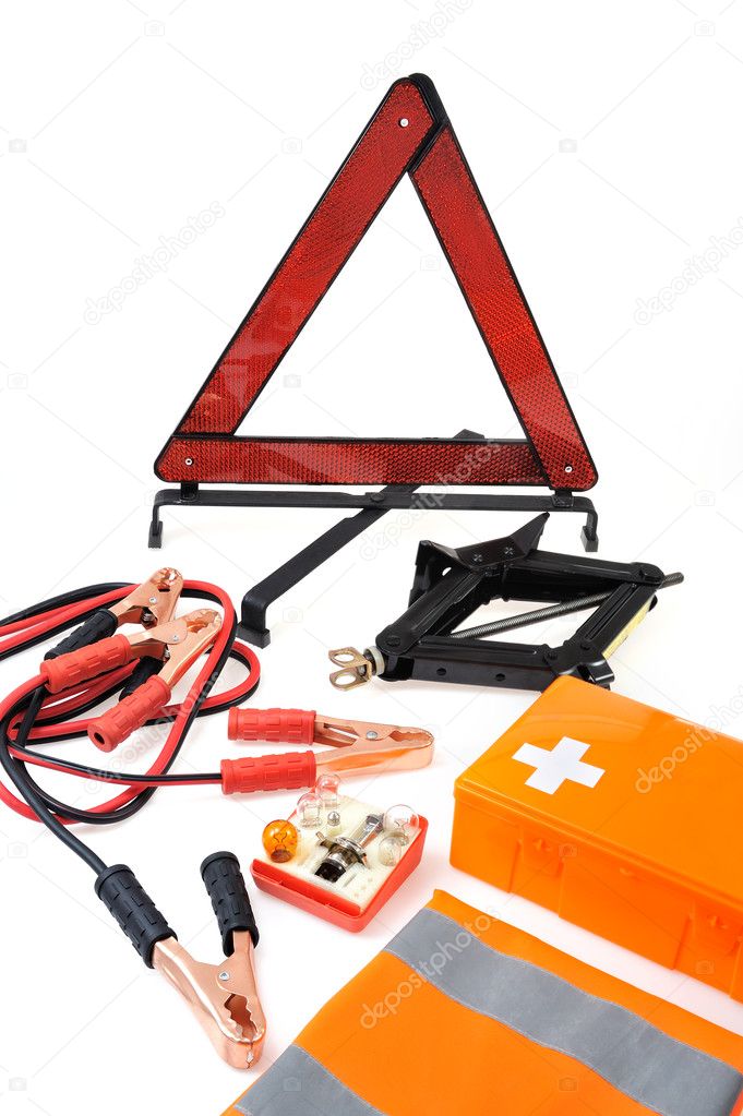 Emergency kit for car - first aid kit, car jack, jumper cables, warning tri